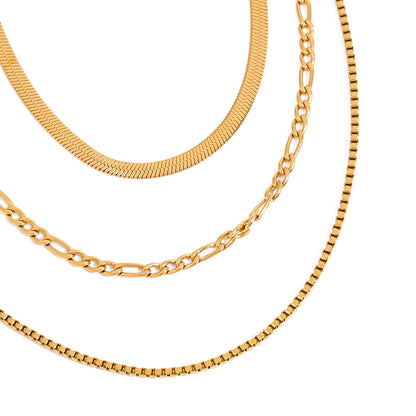 Three gold necklaces of different styles 
