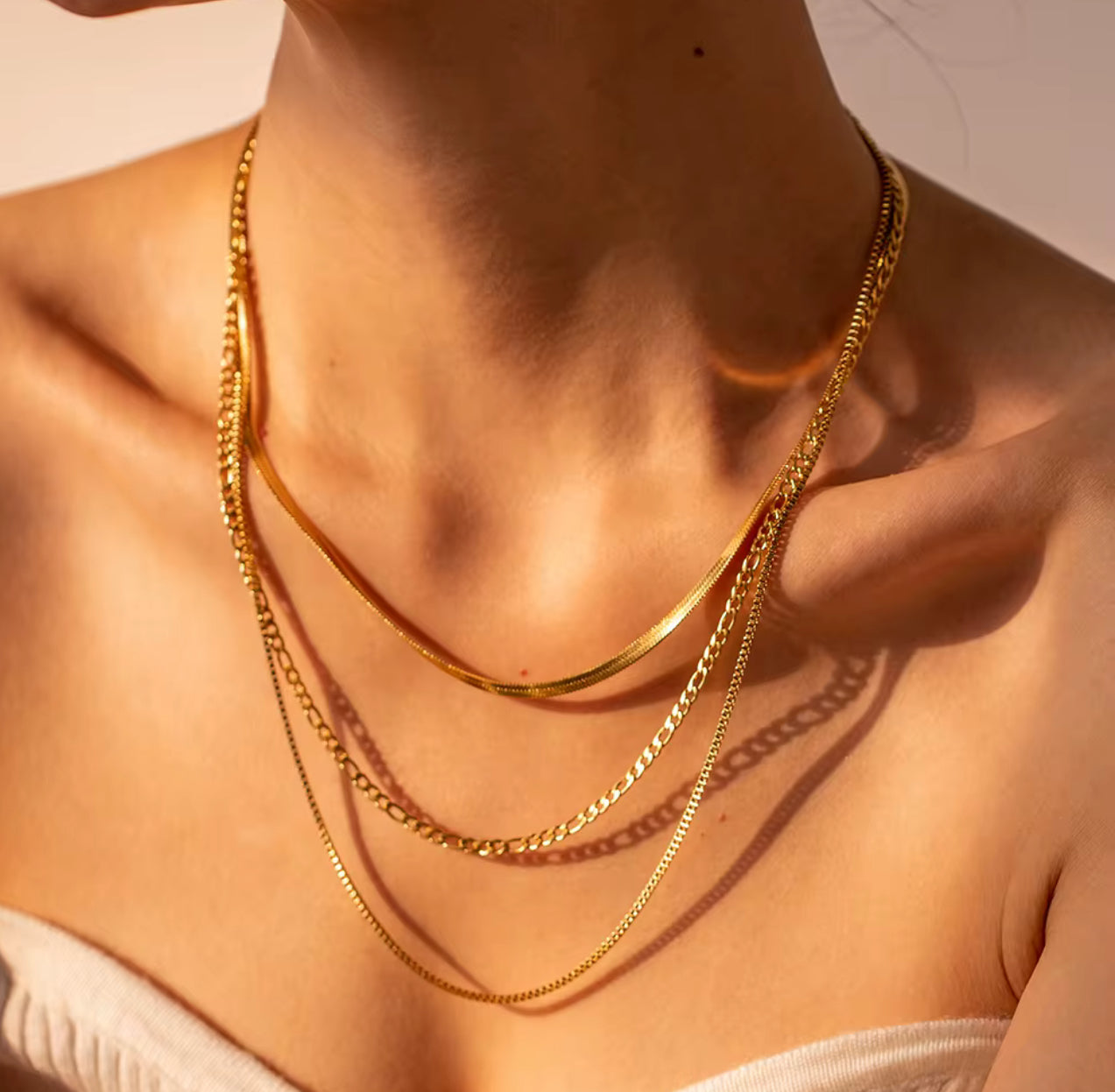 Three layered gold herringbone chain necklace with flat polished chains, minimalist jewelry by Amorin Jewelry