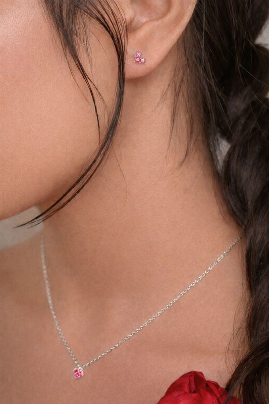 Dainty pink gemstone stud earring side view 